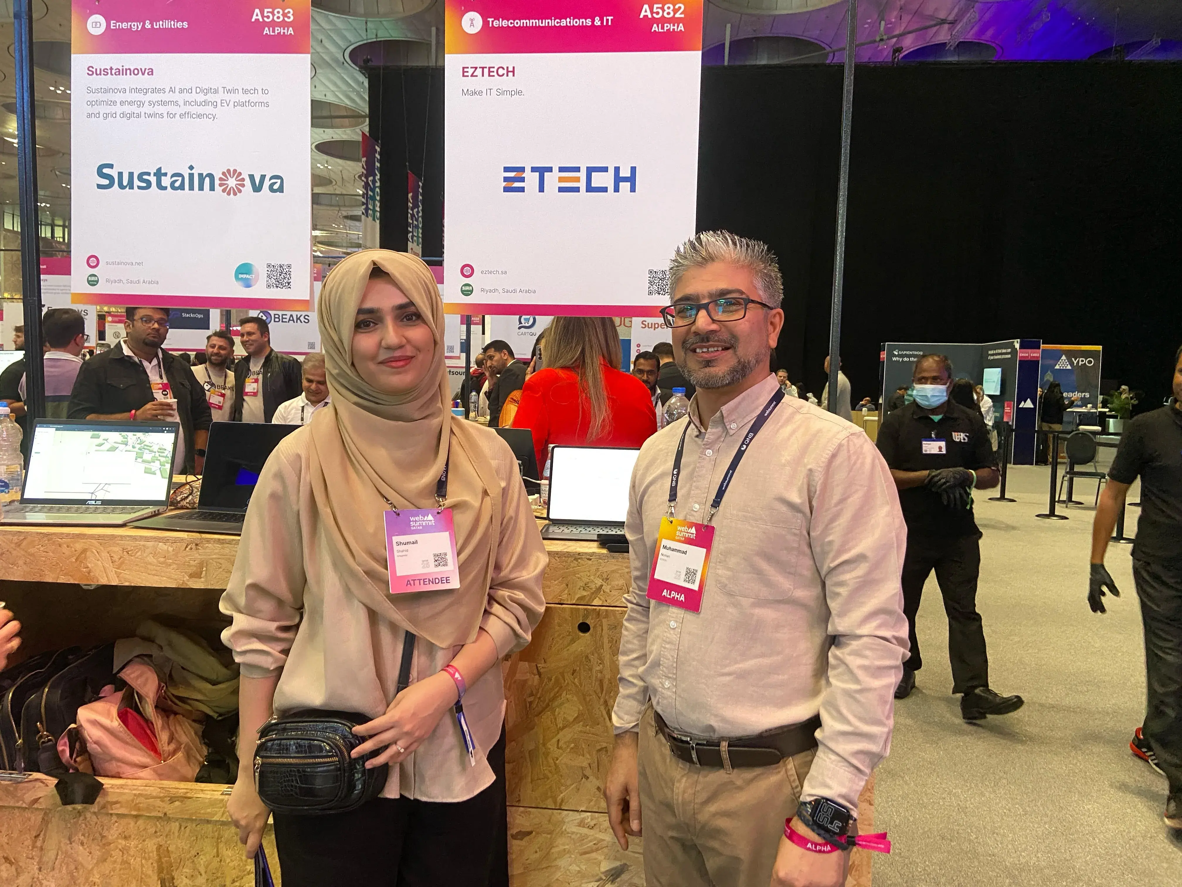 Grayphite representative networking with founders at Web Summit Qatar